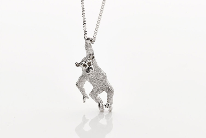 silver chimp necklace