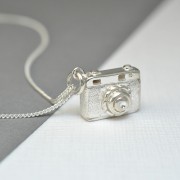 Silver camera necklace