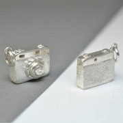 Silver camera necklace